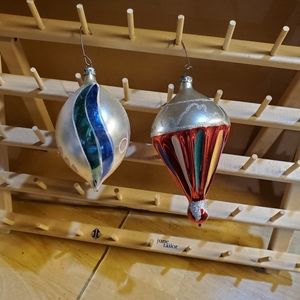 Two glass Christmas ornaments